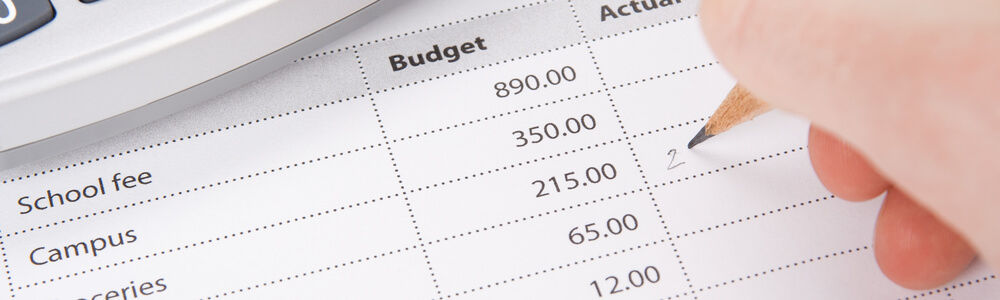 student calculating budget